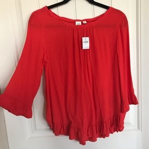 Quarter length flowy top